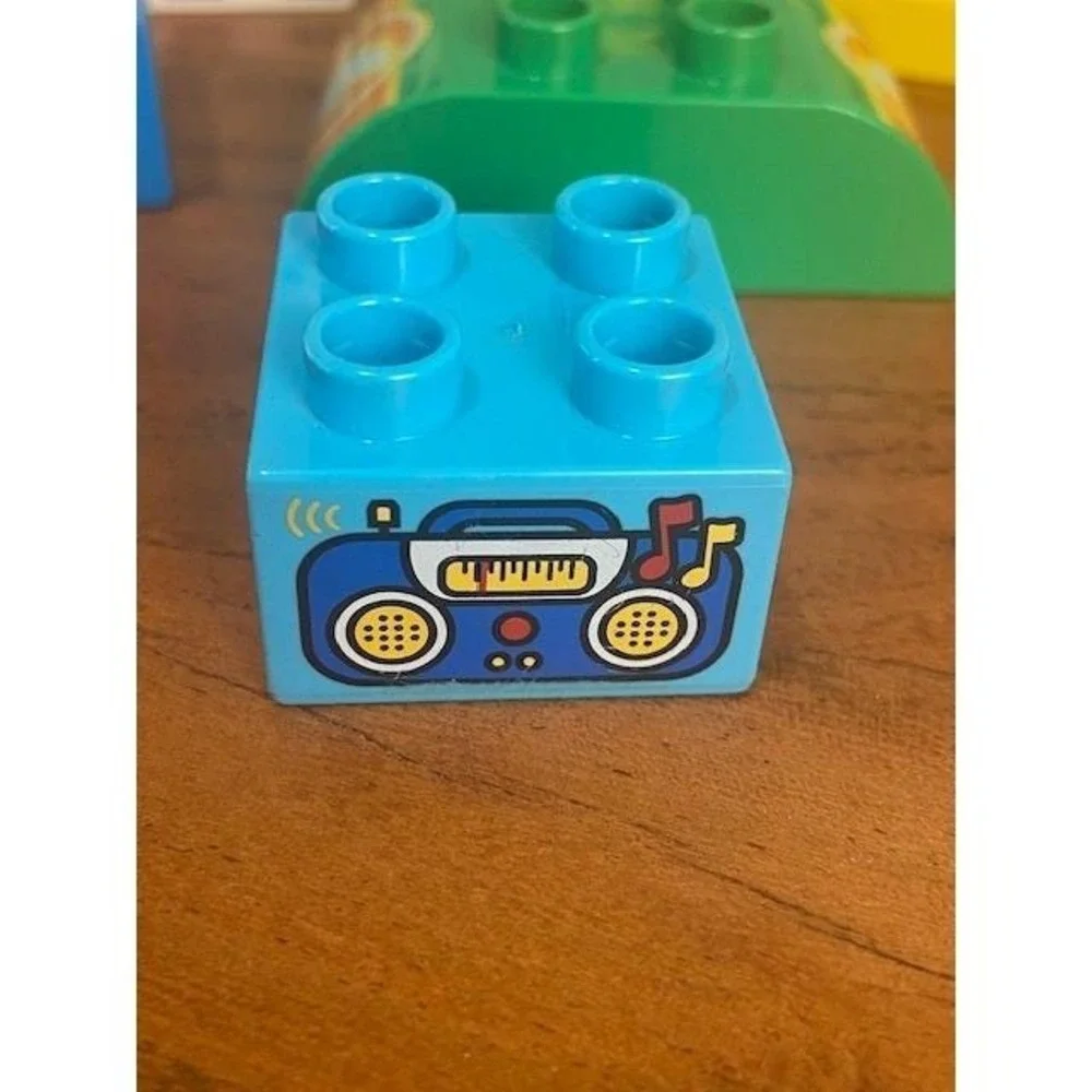 LEGO Duplo Specialty Pieces Lot of 50 Zoo Tiger Piston Cup Octan Racing Trophy